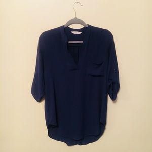 V-neck blue blouse